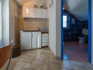 Kuchyň nebo kuchyňský kout v ubytování Apartments Dubravka + 52 fotografií