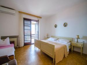 Posteľ alebo postele v izbe v ubytovaní Apartments DESA