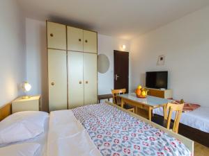 Posteľ alebo postele v izbe v ubytovaní Apartments DESA
