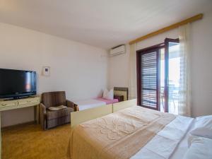 Posteľ alebo postele v izbe v ubytovaní Apartments DESA