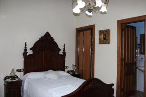 Postel nebo postele na pokoji v ubytování Casa Rural Laura