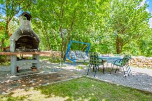 Zahrada ubytování Apartments Tajci