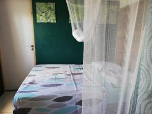 Postel nebo postele na pokoji v ubytování Studio Évasion - Vue imprenable sur la mer