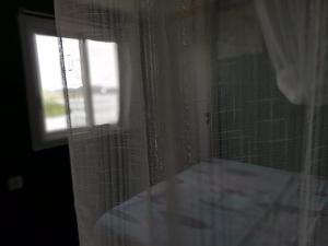 Voodi või voodid majutusasutuse Studio Évasion - Vue imprenable sur la mer toas