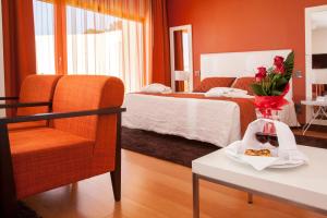 מיטה או מיטות בחדר ב-Hotel Miramar Sul