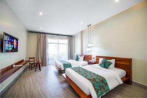 Bayon Modern Residence客房内的一张或多张床位