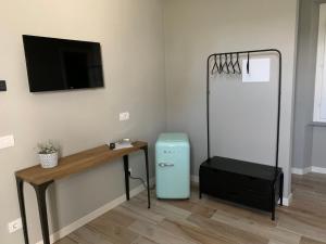 TV a/nebo společenská místnost v ubytování Laficaia Wine Resort