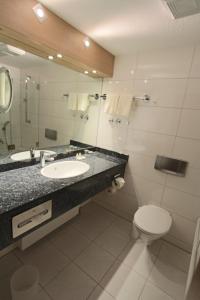 Koupelna v ubytování Eden-Hotel