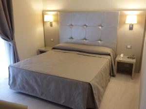Postel nebo postele na pokoji v ubytování Boutique Hotel Calzavecchio