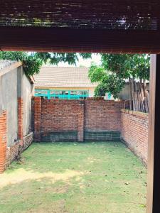 Un jardín fuera de 眷待期休憩所眷村民宿