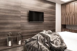 Et tv og/eller underholdning på Luxurious loft with amazing view of Table Mountain
