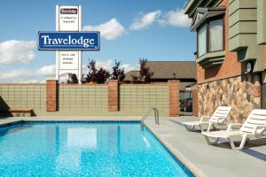 
The swimming pool at or near Travelodge by Wyndham Calgary South
