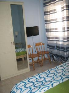 TV a/nebo společenská místnost v ubytování B&B Mare Di S. Lucia