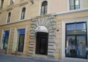 a building with a door on the side of it at Hotel Bonazzi in Perugia