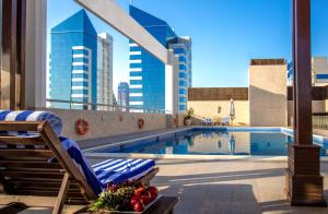 
The swimming pool at or near Gulf Court Hotel
