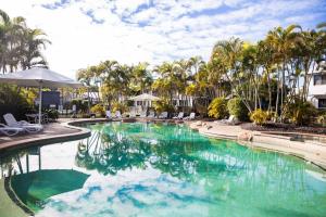 The swimming pool at or close to Tropical Getaway in 2 Bedroom Unit in 4 star Resort