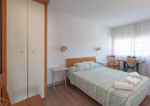 Postel nebo postele na pokoji v ubytování Hola! - El Cortijo