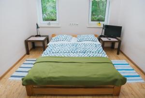 Posteľ alebo postele v izbe v ubytovaní Agroturystyka Pod Modrzewiami