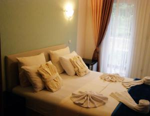 Postel nebo postele na pokoji v ubytování Hotel Wellness & Spa Angelo Gabriel