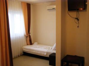 Postel nebo postele na pokoji v ubytování Hotel Wellness & Spa Angelo Gabriel