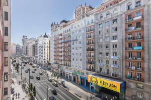 Nespecifikovaný výhled na destinaci Madrid nebo výhled na město při pohledu z penzionu