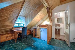 Kuchyň nebo kuchyňský kout v ubytování Hotel Zlatý Orel