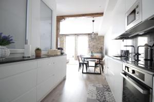 Kuchnia lub aneks kuchenny w obiekcie SunSet Bastian Apartment