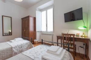 Postel nebo postele na pokoji v ubytování Datini Apartment