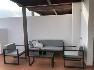 Posezení v ubytování LA CALA HILL CLUB (LOS CORTIJOS)