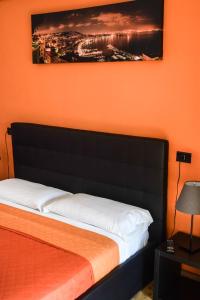 Postel nebo postele na pokoji v ubytování Hotel Kennedy