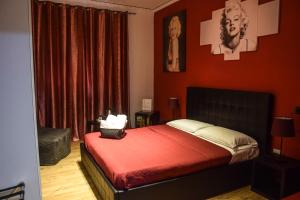 Postel nebo postele na pokoji v ubytování Hotel Kennedy