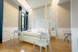 Ένα ή περισσότερα κρεβάτια σε δωμάτιο στο Trastevere Glasshouse