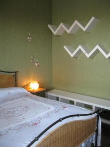 A bed or beds in a room at La casa dei pini