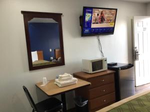TV a/nebo společenská místnost v ubytování Western motel + 30 fotografií