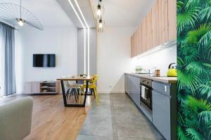 Kuchyňa alebo kuchynka v ubytovaní Grand Apartament + 17 fotografií