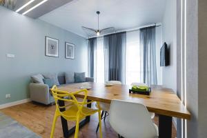Posedenie v ubytovaní Grand Apartament