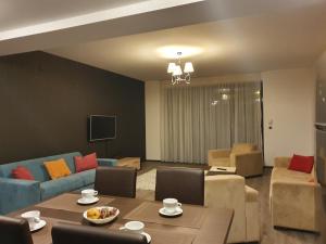 Et opholdsområde på Dream Apartment Poiana Brasov