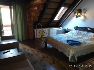 Tempat tidur dalam kamar di Диканька на Тамани 2