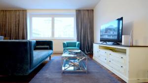Telewizja i/lub zestaw kina domowego w obiekcie Vienna Residence, Naschmarkt - Karlsplatz