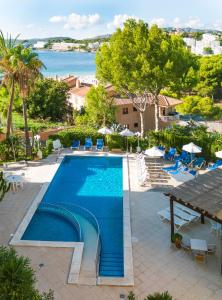 The swimming pool at or close to Apartamentos Casa Vida