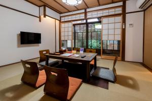 TV a/nebo společenská místnost v ubytování Mibu Momiji
