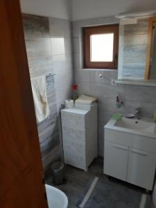 Koupelna v ubytování Apartments Žile