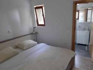 Postel nebo postele na pokoji v ubytování Apartments Žile