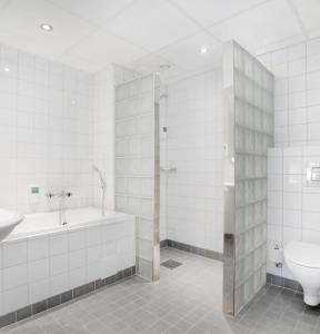 Kúpeľňa v ubytovaní Hurdalsjøen Hotel