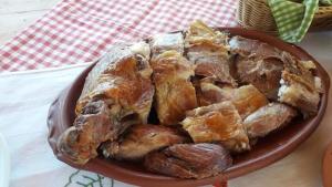 a plate of pastries and nuts on a table at Konoba Ognjište in Sokolac