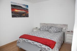 Łóżko lub łóżka w pokoju w obiekcie Piso das Costureiras