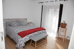 Łóżko lub łóżka w pokoju w obiekcie Piso das Costureiras