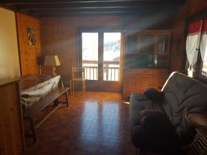 Postel nebo postele na pokoji v ubytování APPARTEMENT VUE SUR LES PISTES Aux SAISIES 4