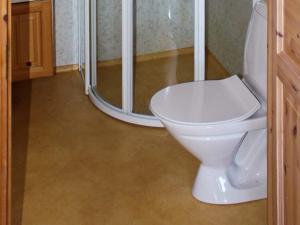a bathroom with a toilet and a shower at 6 person holiday home in Brekstad in Brekstad +18 photos