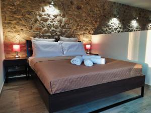 Кровать или кровати в номере Guesthouse Kastelia